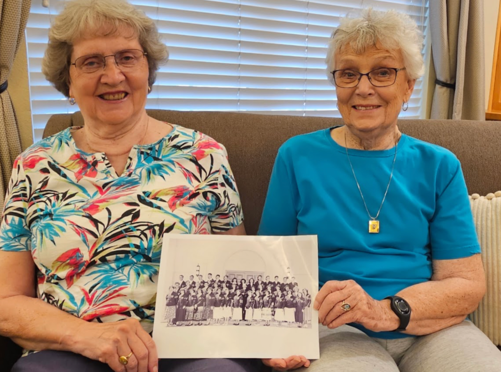 grandmothers holding a photo